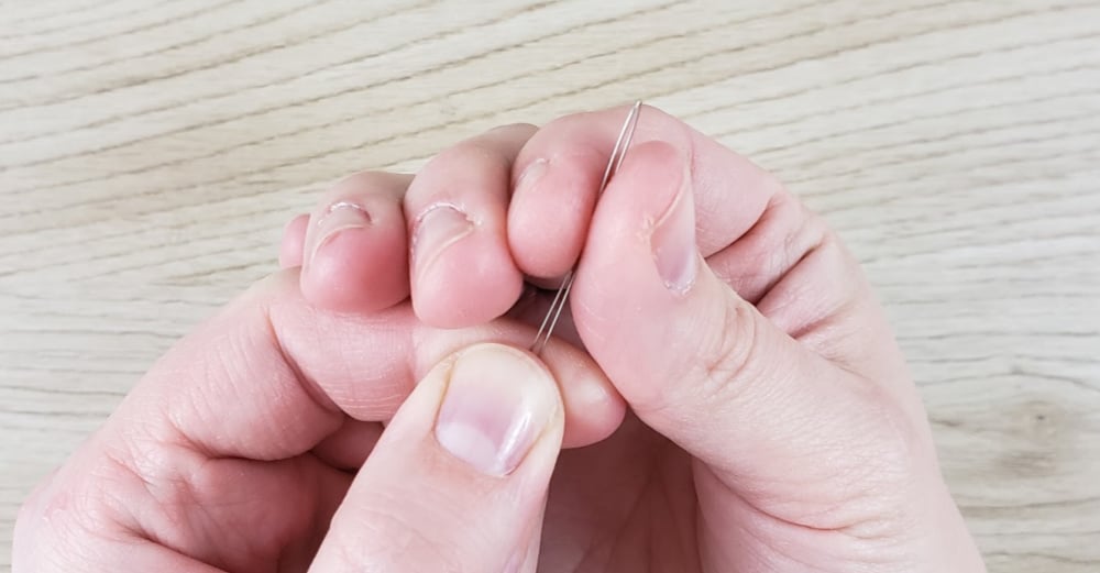 Bending wire in half