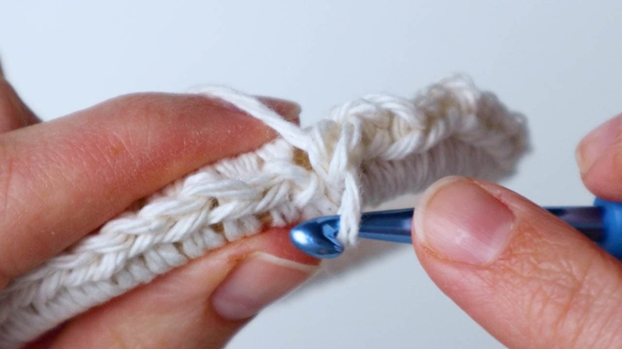 Hand-Knitted Kitchen Towel Holder with Wooden Rings