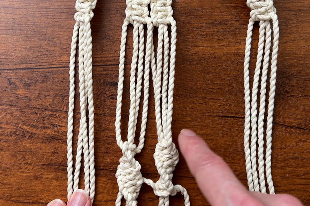 lining up the knots so the space is equal on all the arms